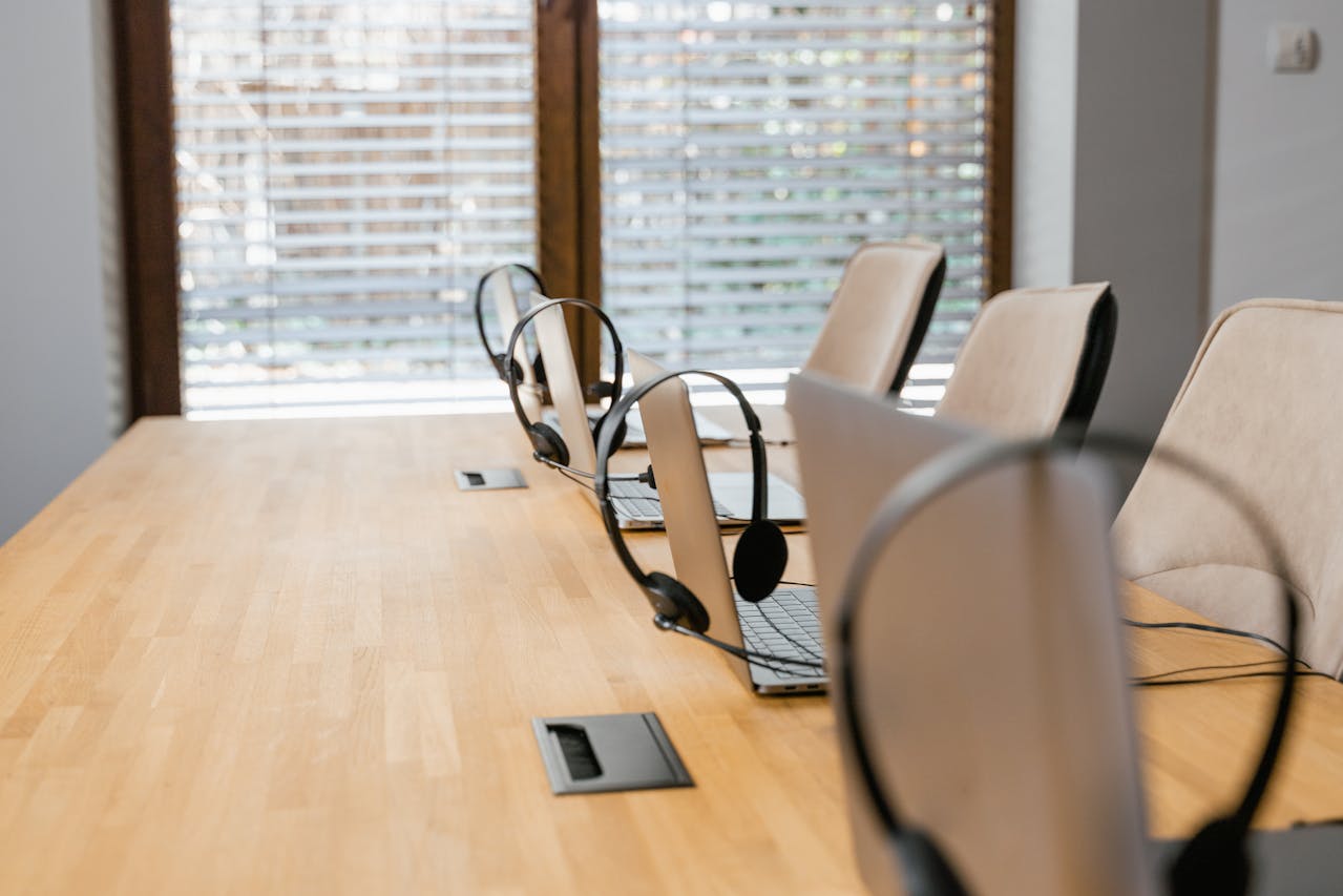 Chairs with laptops in front of them